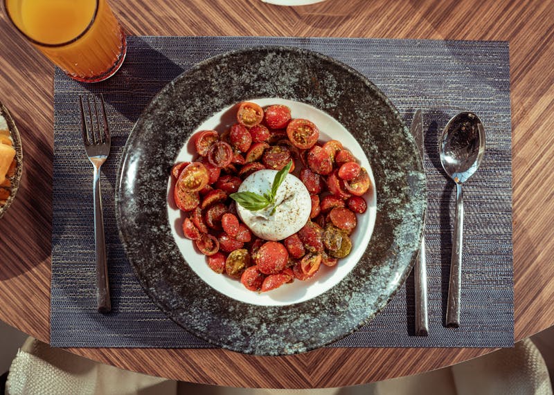 Insalata Caprese — fresh tomato and mozzarella salad at Pizzana